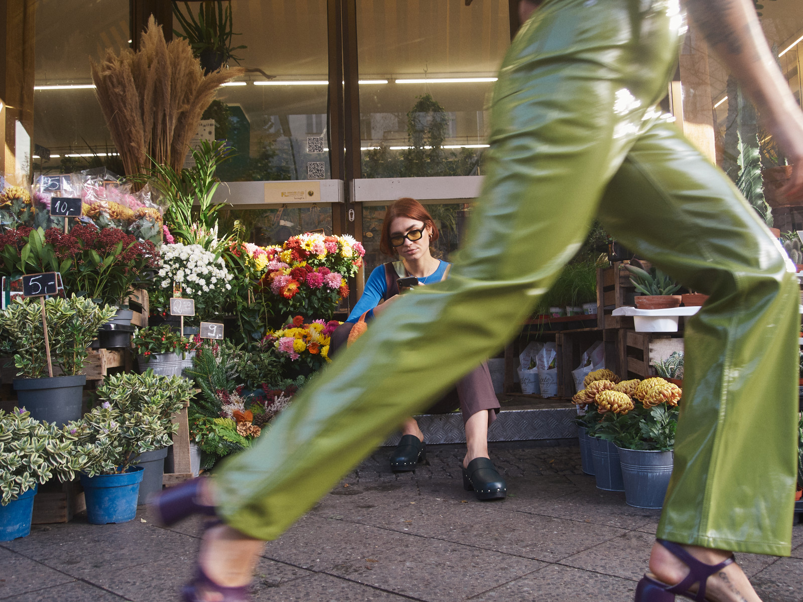 A local flower shop with a student customer