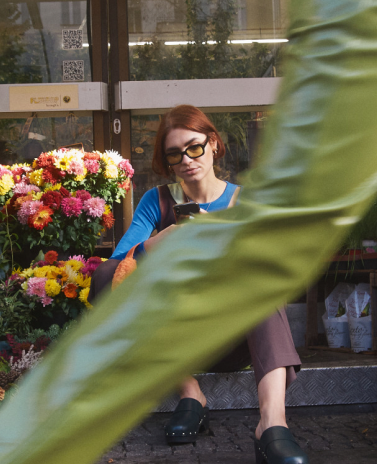 A local flower shop with a student customer